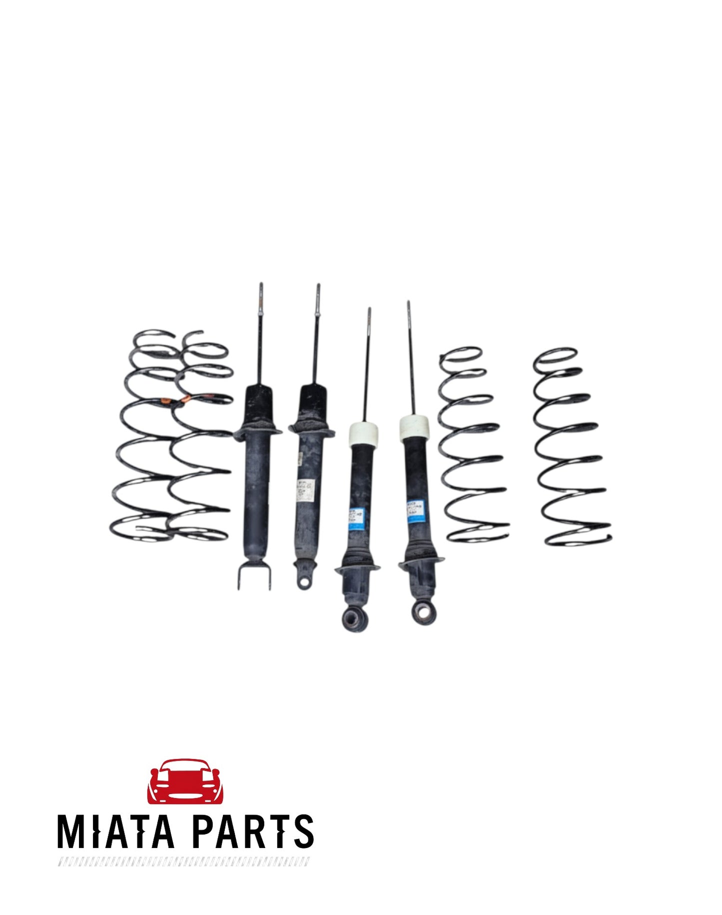 Miata Parts NZ used MX5 NC shock and spring set including four black coil springs and four shock absorbers.